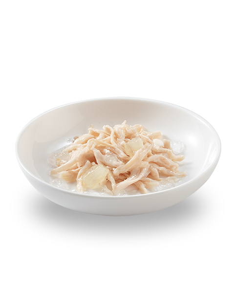 Close-up of tender chicken pieces in aloe jelly for kittens