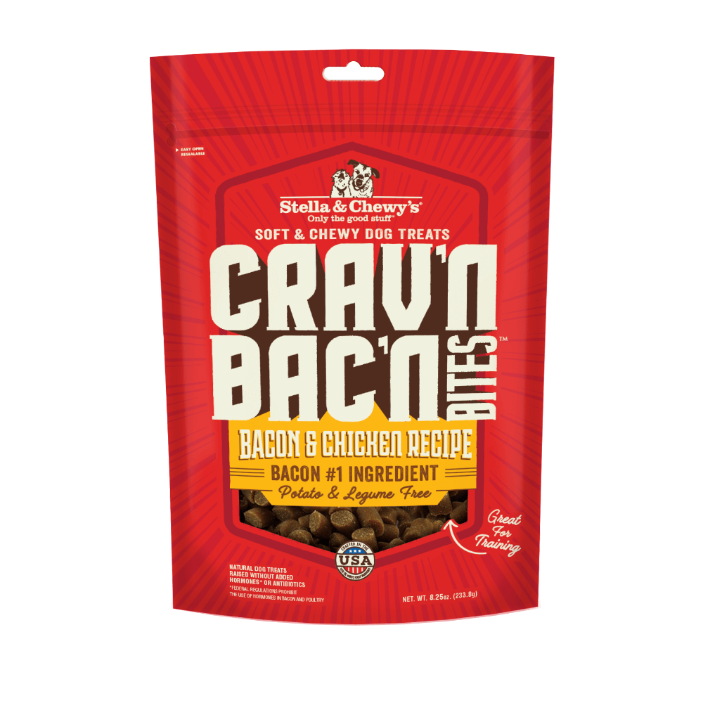 Stella & Chewy’s Crav’n Bac’n Bites dog treats packaging featuring bacon and chicken recipe, potato-free and legume-free, made in the USA.