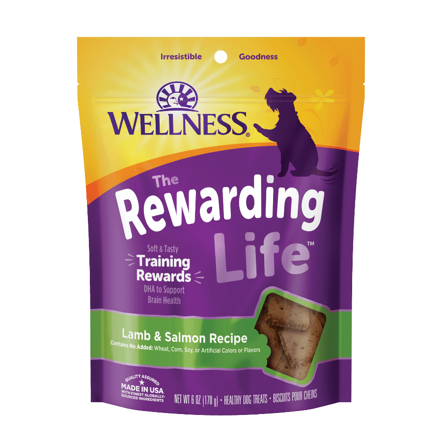 Wellness Rewarding Life Lamb & Salmon Dog Training Treats packaging with soft, chewy treats for dogs.