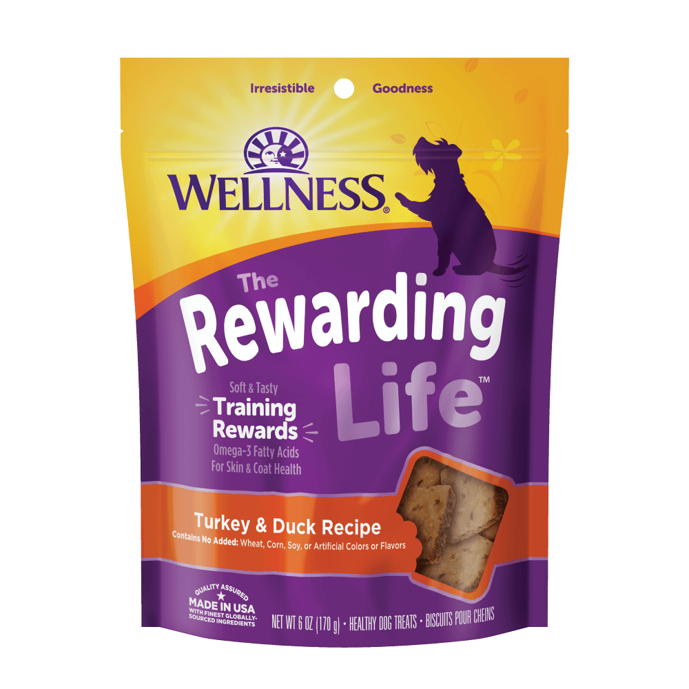 Wellness Rewarding Life Turkey & Duck dog training treats in a vibrant package, highlighting natural ingredients and delicious flavors.