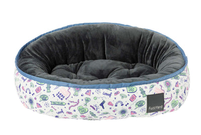fuzzyard Dog bed with colorful patterned exterior and gray interior on a white background
