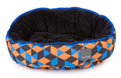 Pet bed with geometric pattern and 'FuzzYard' branding on a white background