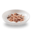 Close-up of tuna and pilchards chunks in natural jelly