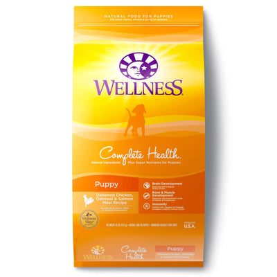Wellness Complete Health Just For Puppy dry food with chicken, oatmeal, and salmon meal