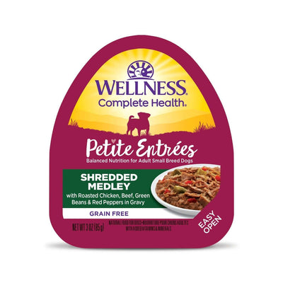 Wellness Petite Entree Shredded Medley dog wet food with roasted chicken, beef, green beans, red peppers in gravy.
