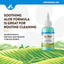 NaturVet Ear Wash bottle with text about soothing aloe formula for routine cleaning on a scenic background.