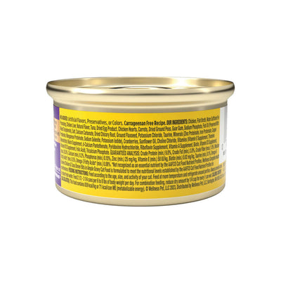Wellness Complete Health Chicken & Tuna Dinner canned cat food, featuring nutritional ingredients and gravy texture.